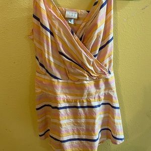 Body fitting tank top that wraps and ties in the back for a snatched finish ❤️